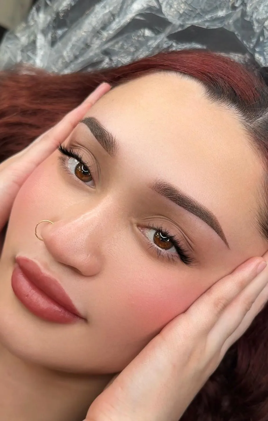 Natural-looking healed eyebrow and lip blush result